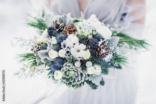 Winter Wedding Bouquet In Hands Of Bride Stock Photo And Royalty