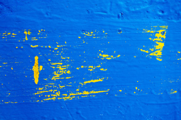 Painted wood texture with yellow and blue colors