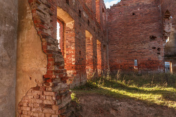 City Disna. The ruins of the hospital in the small city of Belarus of red brick. The building is in a dilapidated condition. The ancient city where Jews lived
