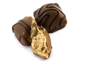 Chocolate candies isolated on white background.