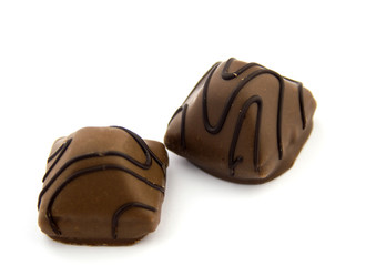 Chocolate candies isolated on white background.