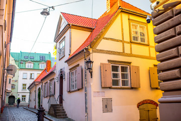 Fototapeta premium Ancient residential houses with window shutters in the old town of Riga