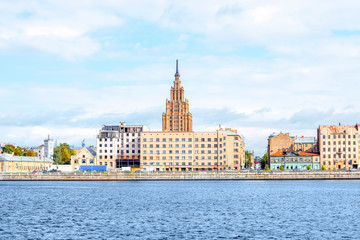 Fototapeta premium View on the riverside with Science Academy skyscraper in Riga, Latvia