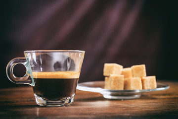 Transparent cup of espresso