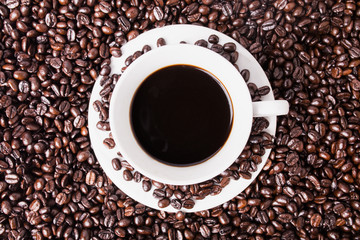 Coffee beans and cup