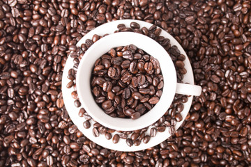 Coffee beans and cup