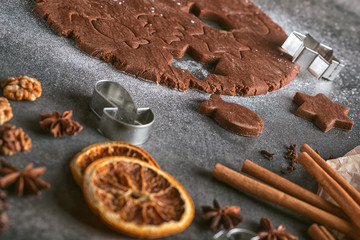 cutting gingerbread cookie with cinnamon and walnuts for Christmas, christmas baking