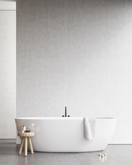 Bathtub with a chair and a towel near a white wall