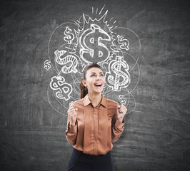 Ecstatic woman near a chalkboard with dollar signs