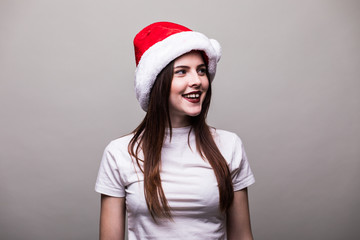 Beautiful female model wear santa hat smile