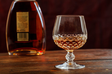 Bottle and crystal glass of cognac