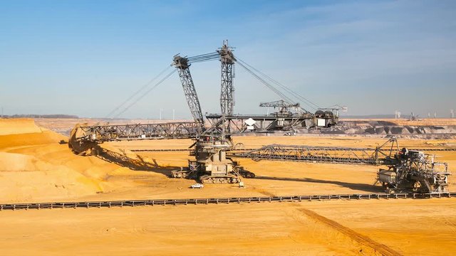 Timelapse of a giant Bucket Wheel Excavator at work in an endless lignite pit mine
