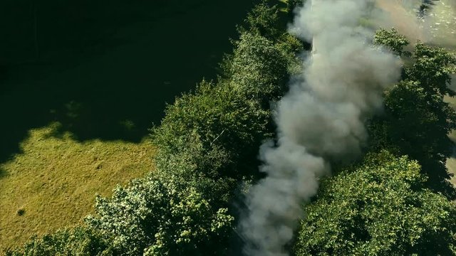 Aerial footage of steam train from 1910s