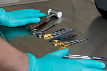 hands and medical instruments. plastic surgery