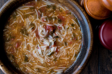 Turkish Traditional Vermicelli Soup in a wooden bowl / Tel sehri