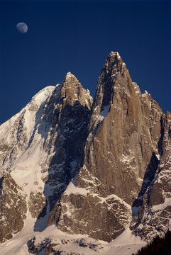 Jagged peak of Aiguille du Dru and the moon, Chamonix, Rhone Alpes, France