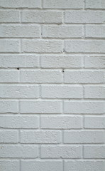 Obraz premium Brick wall painted white to provide a background for your text or images