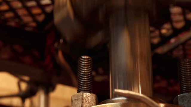 An ultra close-up view of an industrial engine piston in motion
