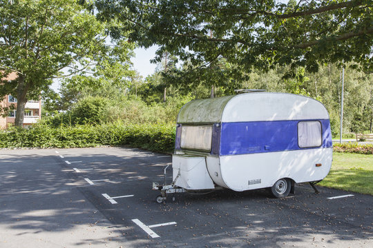 Sweden, Blekinge, Solvesborg, Camping trailer in parking space