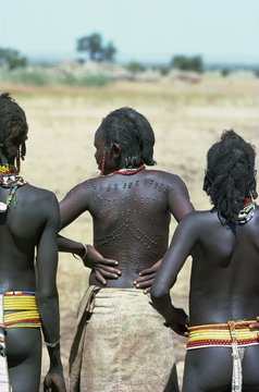 Nuba women with scarred backs, Sudan