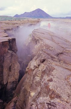 Mygrata Grotogya rift fissure along divergent plate boundary with geothermal steam, North East Iceland