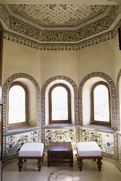 Coloured glass work inlaid into plaster in seating area of bedroom suite, Devi Garh Fort Palace Hotel, near Udaipur, Rajasthan state