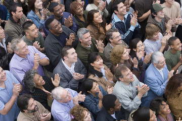 High angle view of multiethnic people clapping together