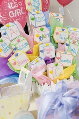 Baby shower presents and blocks on table