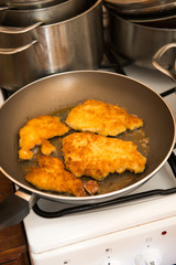 fried pork chops in the pan