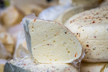piece of delicious fresh white cheese at the exhibition