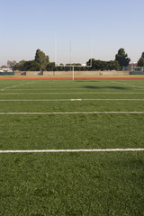 American football field with goal post in background