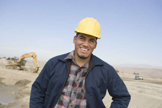 Portrait of happy architect at construction site