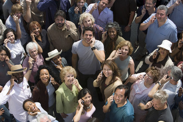 High angle view of multiracial people using cell phones