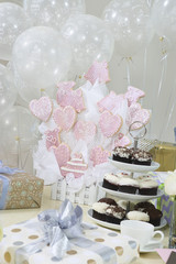 Gifts, decorations and cake stand at hen party