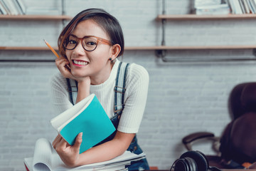 Picture of Asian women were happy to learn from reading