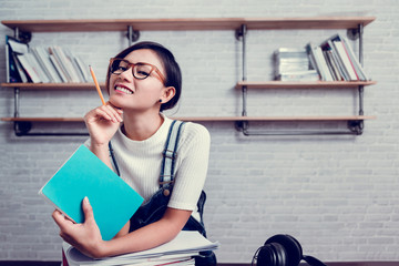Picture of Asian women were happy to learn from reading