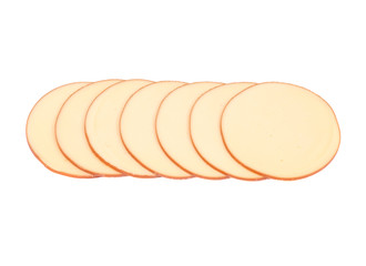 Sliced amish farm organic smoked gouda cheese isolated on white background