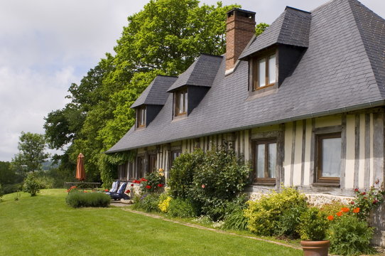 An old half timbered barn converted into a house, Normandy, France