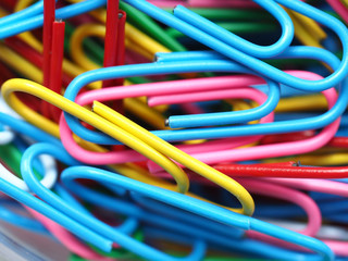Pile of colorful clips with blurred focus for background