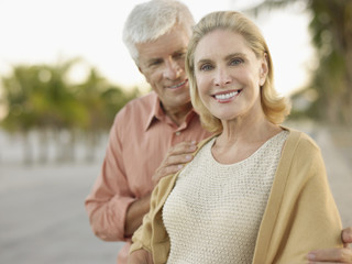 Portrait of happy couple spending time on tropical beach