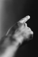 Hand pointing (b&w) (close-up)