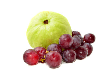 Fresh guava with red grapes isolated on white background