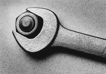 Wrench and bolt (b&w)