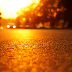 the glare of the hot sun on the hot asphalt