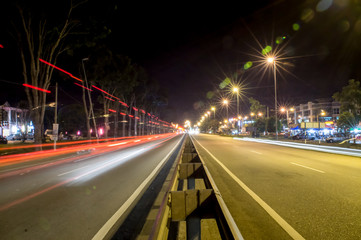 Fototapeta na wymiar light trail at the roadside of Sri Iskandar, Perak, Malaysia