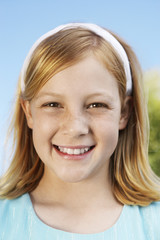 Close up of a teenage girl smiling