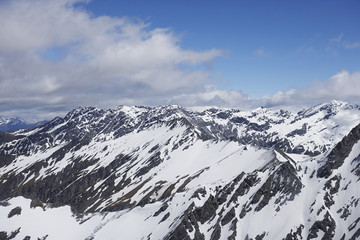 Fototapeta na wymiar Snow-covered mountain peaks
