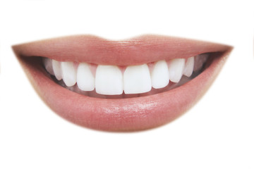Closeup of beautiful smile with healthy teeth on white background