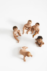 High angle portrait of multiethnic babies on white background