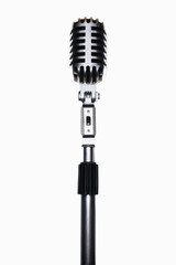 Fototapeta premium Old fashioned microphone isolated over white background